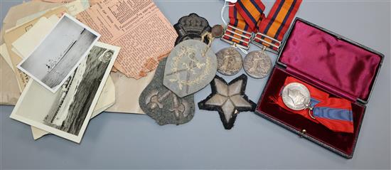 Two Boer War family medals QSA with two or three clasps to Truman, a George VI for faithful service medal, various badges. and photos.